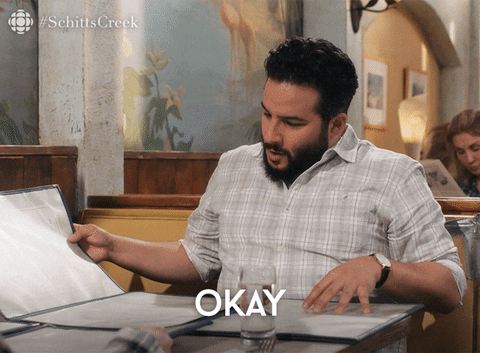 Schitt's Creek character says, "Okay, I don't even know where to start with this menu." [gif]