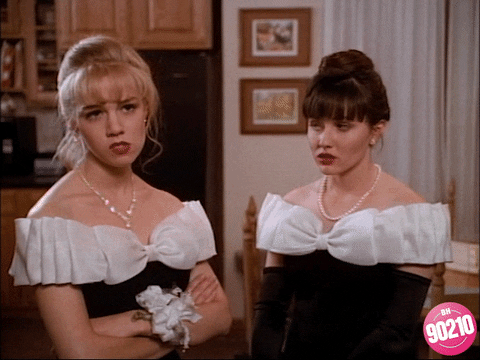Kelly and Brenda from 90210 are wearing the same dress to the dance! They give each other real bitch looks. [gif] [alt]