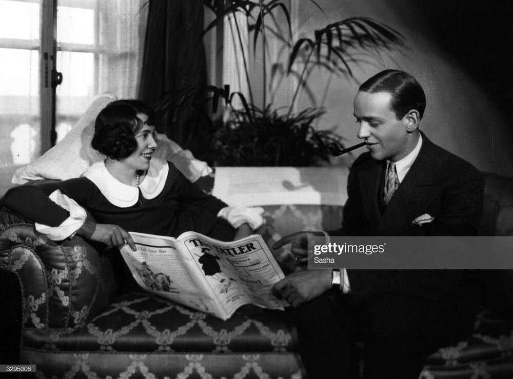 1926 photograph of Fred Astaire and his sister Adele reading ‘The Tatler’ a British lifestyle magazine. Unidentifiable large rectangular wristwatch. (Photo by Sasha/Hulton) Image credit:  Getty Images