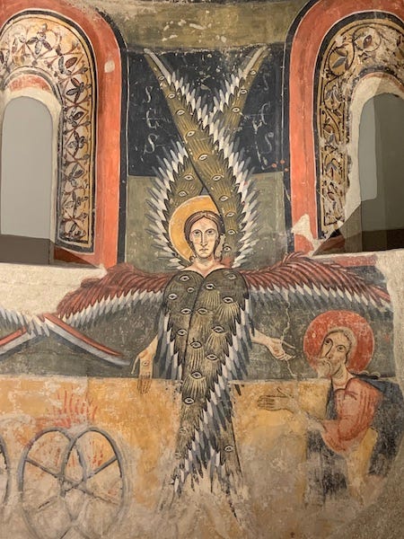 Angel with 6 wings and eyes