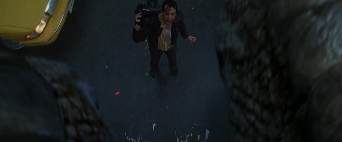 Hank Azaria's news cameraman character, screaming in fright as Godzilla's foot comes within inches of his body. From the 1998 film 'Godzilla'