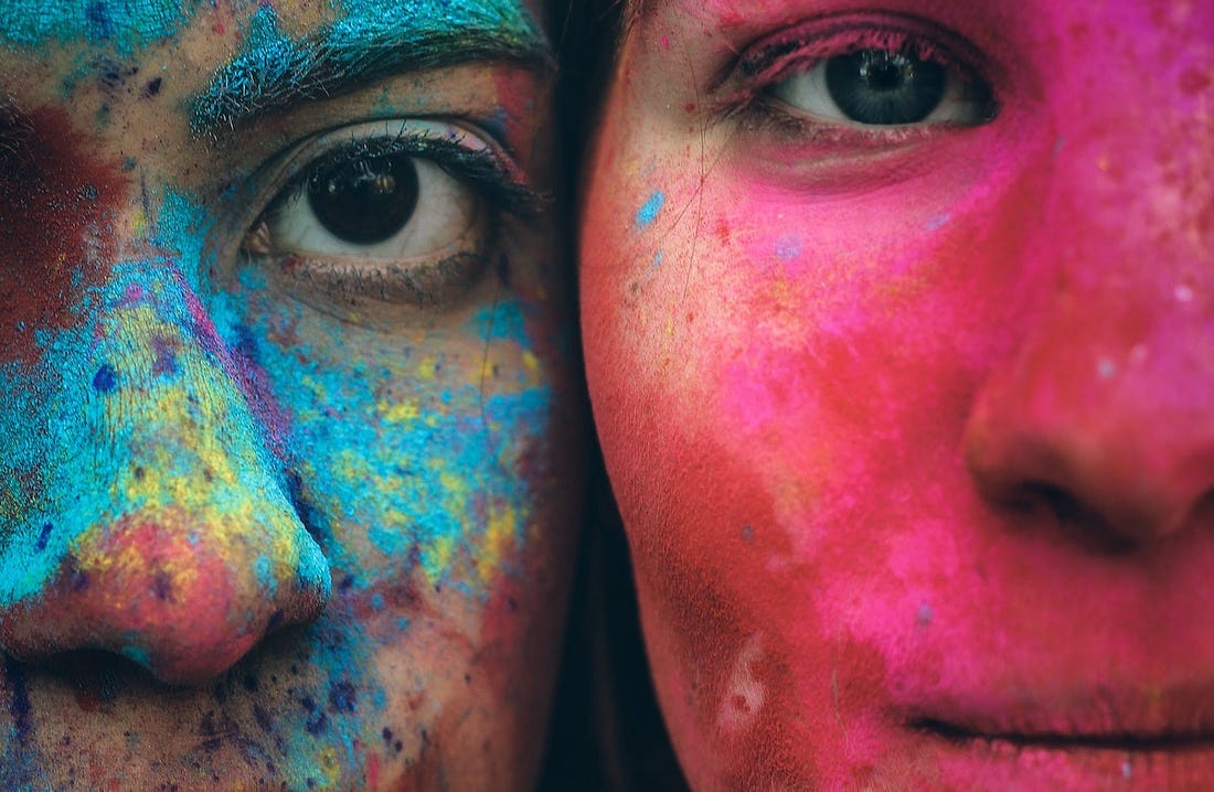Image of two girls faces painted for article by Larry G. Maguire on creativity