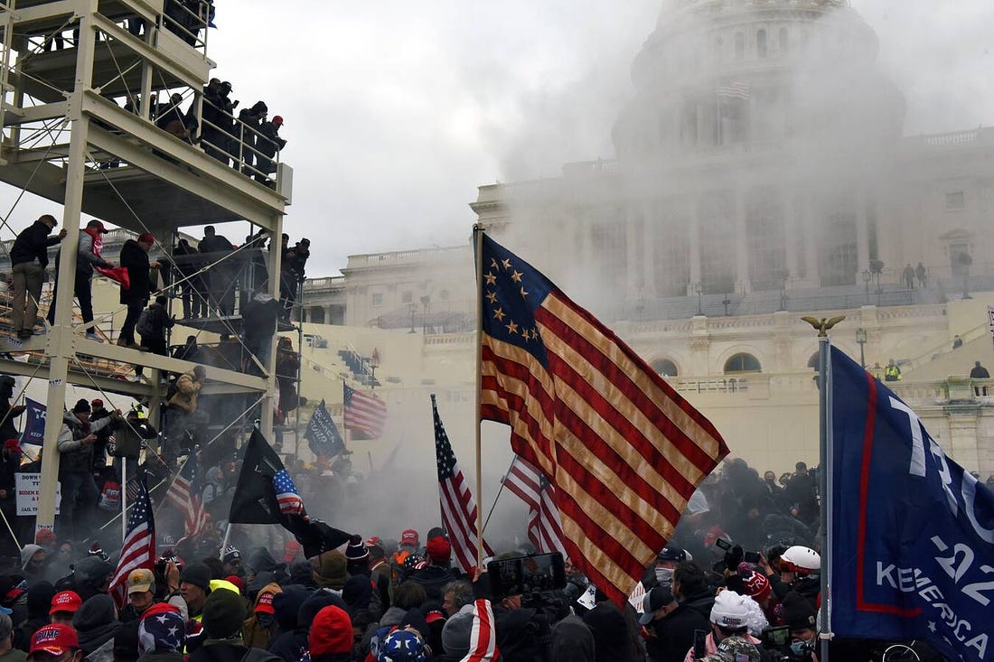 Photo showing insurrectionists storming the capitol