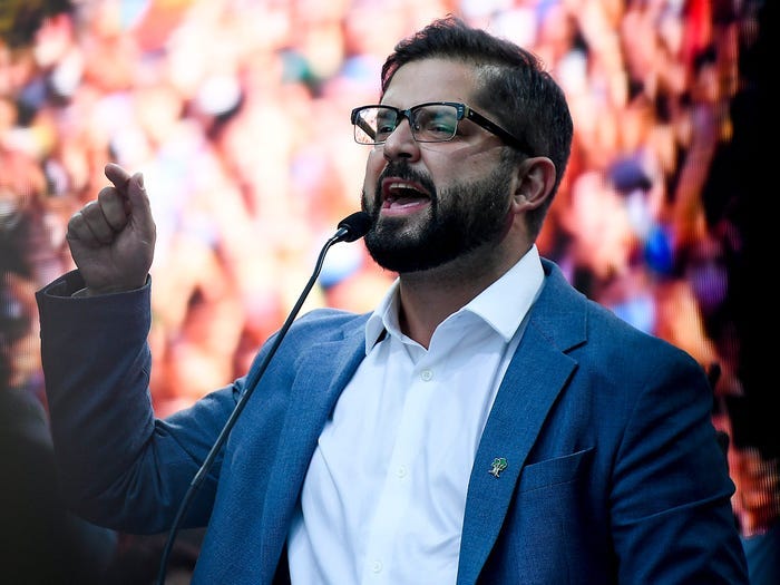 Presidential candidate Gabriel Boric, of the I approve Dignity coalition, talks during his closing campaign rally ahead of the presidential run-off election in in Santiago, Chile, Thursday, Dec. 16, 2021.
