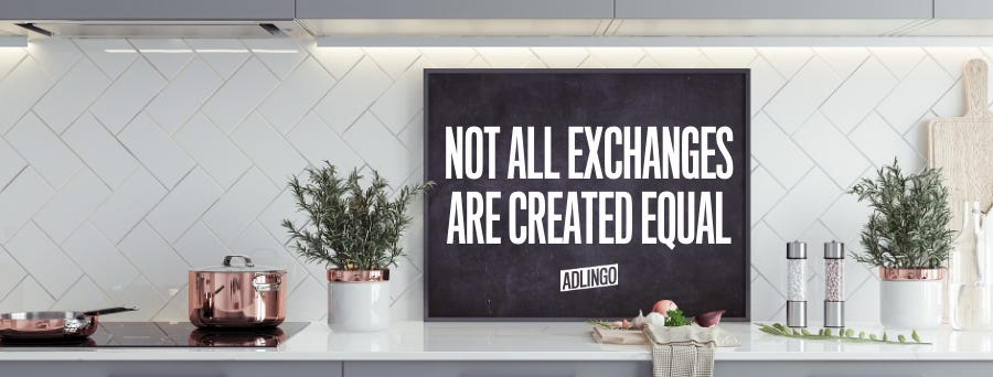 Not all exchanges are created equal. Written on a chalkboard in a white, modern kitchen.