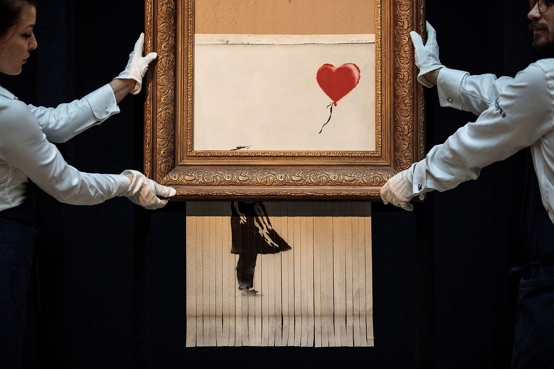 Sotheby's Unveils Banksy's Newly Completed Artwork 'Love in in the Bin'