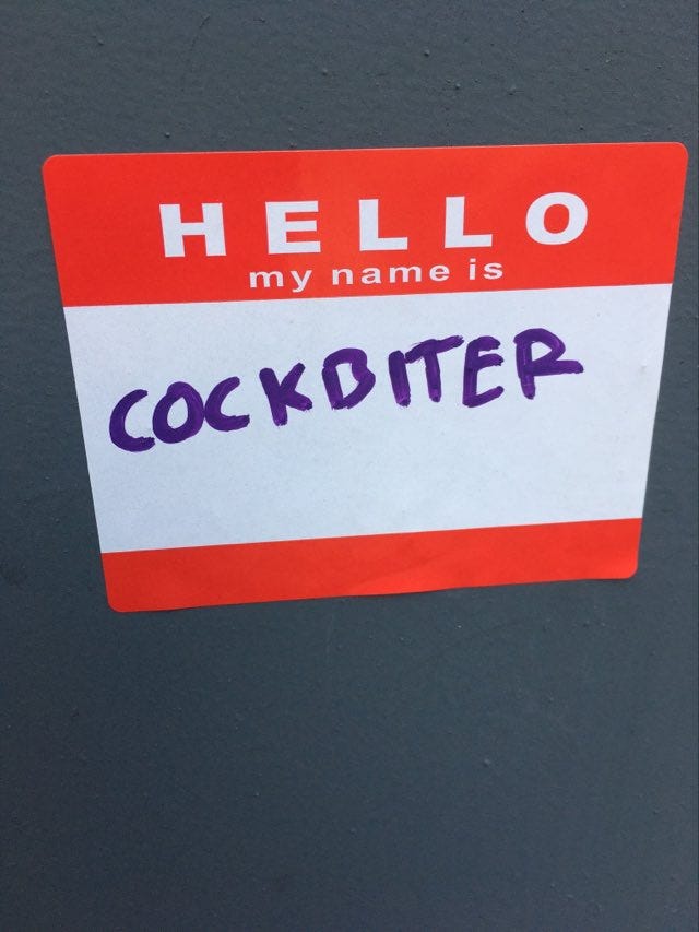A label that says hello my name is cockbiter