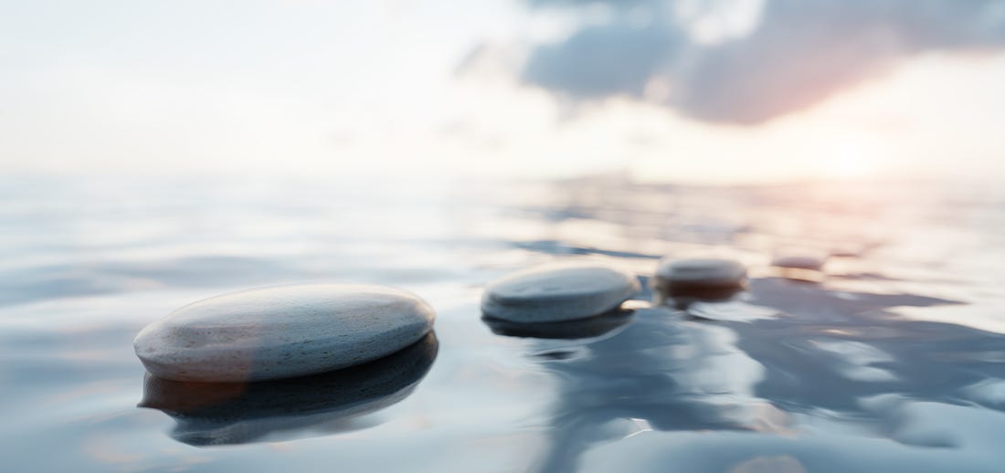stones on water for meditation vibe