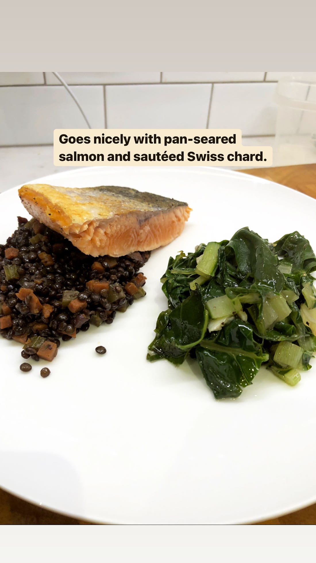Lentils served with salmon and Swiss chard