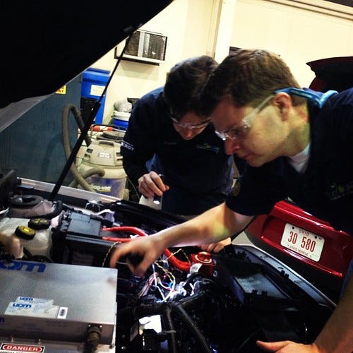 "Taking a look under the hood of @psuecocar2 #regionalinspections #ecocar2 #avtc" by AVTC Series is licensed under CC BY-ND 2.0