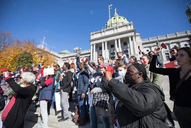 Supporters of a lawsuit challenging Pennsylvania's school funding rally on the steps of the Capitol Building in Harrisburg Nov. 12, the first day of trial in the historic case.