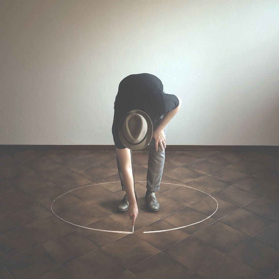 Man Drawing Himself into a Circle