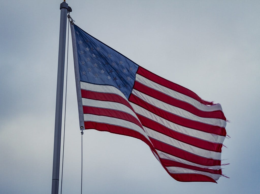"Tattered American Flag" by Tony Webster is licensed under CC BY-SA 2.0