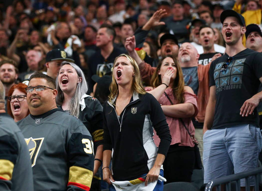 Golden Knights fans react to a bad call during the first overtime period of  Game 2 of an NHL hockey second-round playoff series against the San Jose  Sharks at T-Mobile Arena in