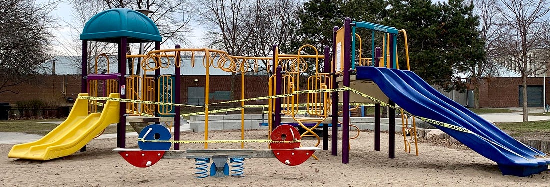 A Toronto playground covered in caution tape