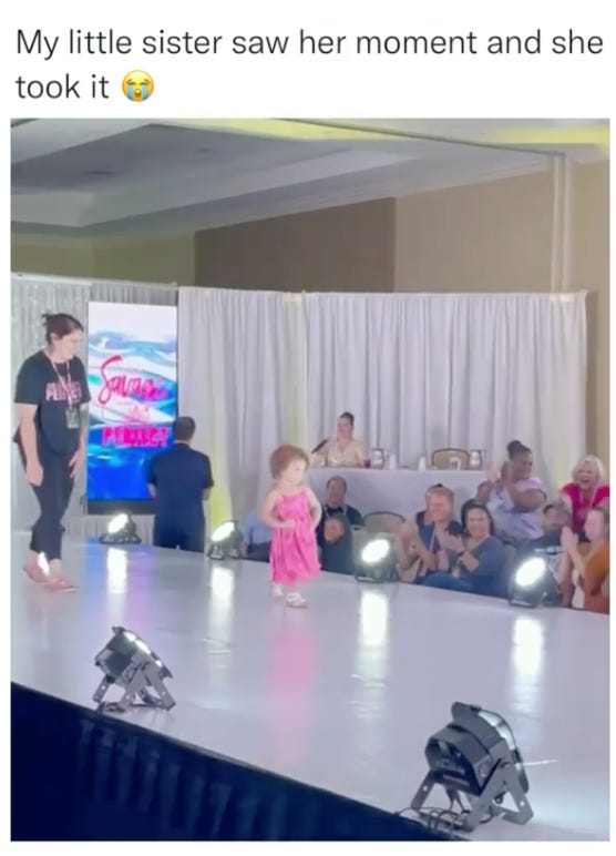 A screenshot showing the title "my little sister saw her opportunity and took it". Below is a catwalk with an audience clapping, a small girl in pink with her hands on her hips standing in the center, and someone who looks to be following her to collect her.