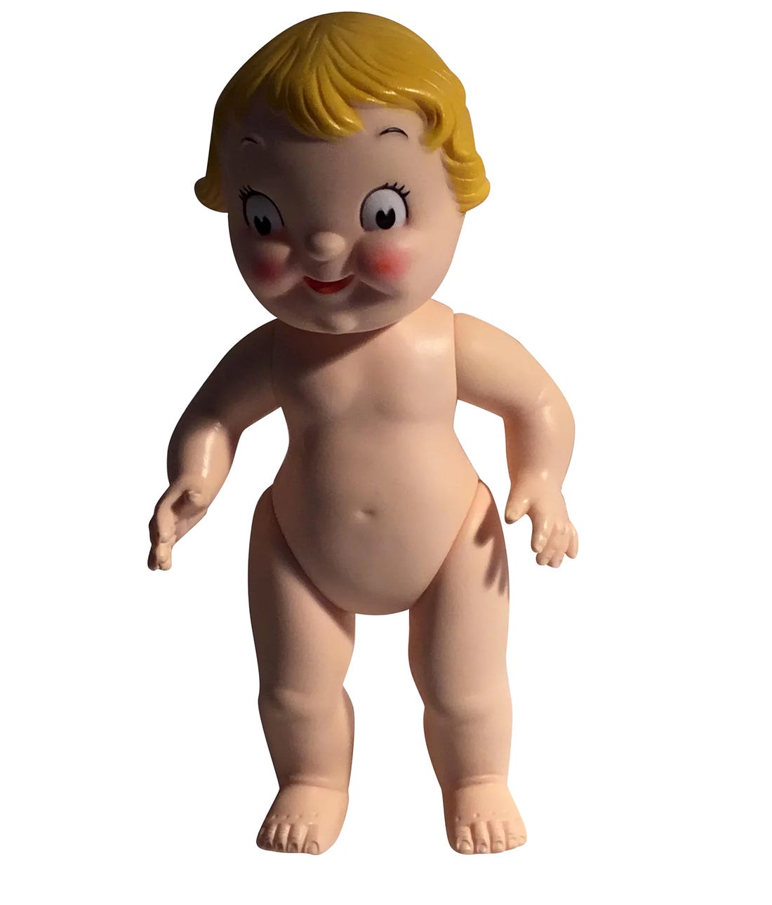 Oh my god. It's a naked blond baby with these wide eyes with dark pupils and rosy cheeks and a mouth that dares you to come near because it will bite you and infect your soul. I am shuddering as I write this, I swear to you.