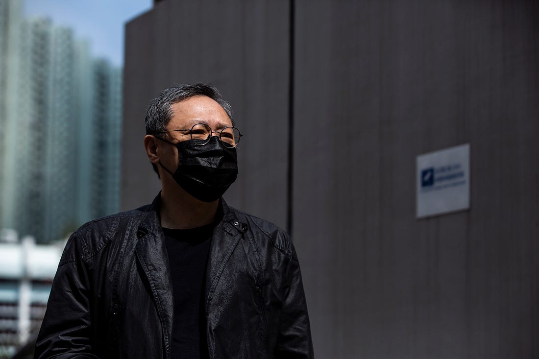 Hong Kong law professor and pro-democracy activist Benny Tai arrives at Ma On Shan police station in Hong Kong on February 28, 2021, where he and 46 other dissidents were each charged with one count of "conspiracy to commit subversion" under the city's new national security law. (Photo by ISAAC LAWRENCE / AFP) (Photo by ISAAC LAWRENCE/AFP via Getty Images)