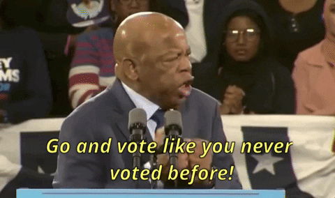 A gif of John Lewis standing at a podium and saying, "Go and vote like you never voted before!"