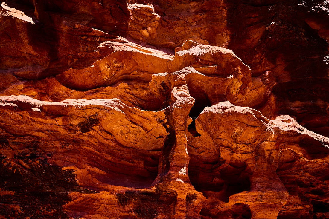 natural red rock scuptures in canyon by Andy Batt