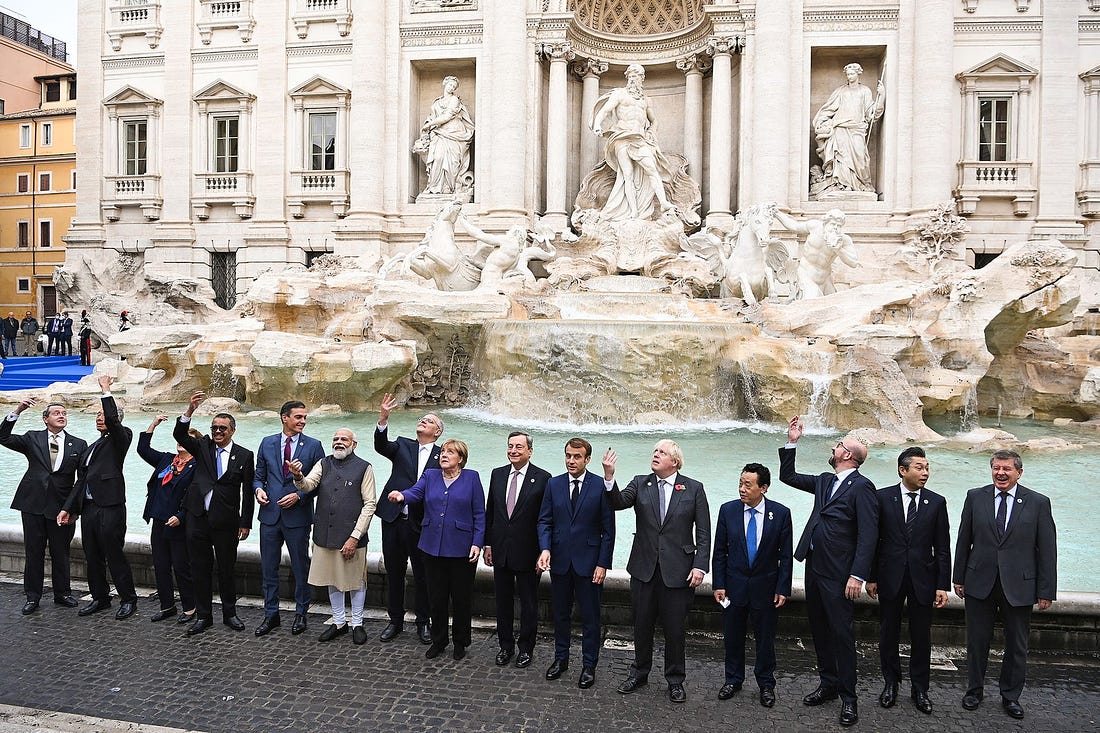 Boris Johnson, fifth right, joins G20 leaders during a visit to the Trevi fountain in Rome, on Oct. 31.