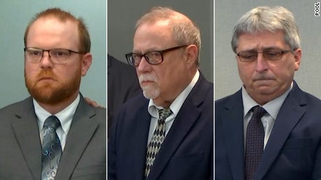 Image of three white men in suits, Ahmaud Arbery's killers sentenced to life in prison