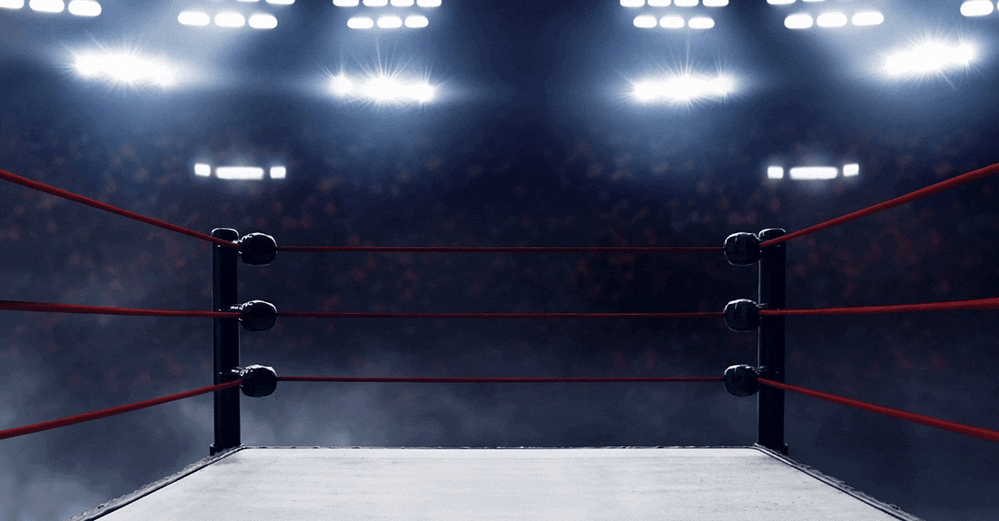 Walmart and Target brand logos facing off in a "boxing ring."