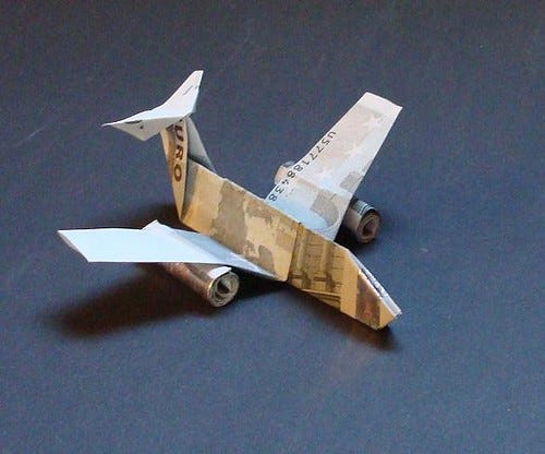 Origami Geld Flugzeug