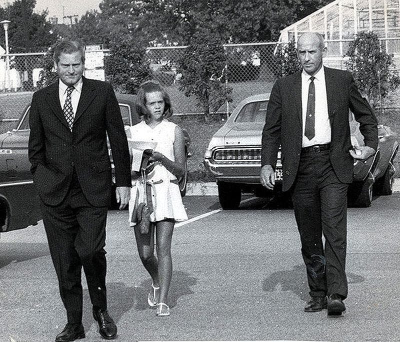 In 1970, then Gov. Linwood Holton, left, set an example by escorting his daughter, Tayloe, to Richmond's all-black high school where she had been assigned. (The Associated Press file photo)