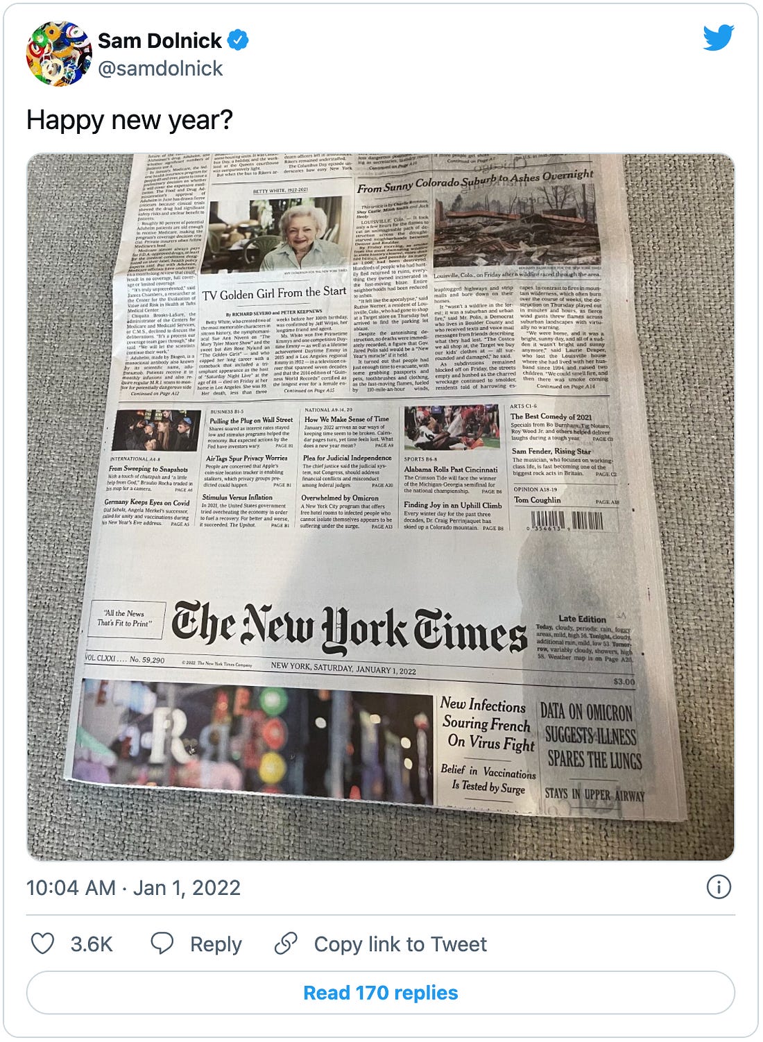 Tweet by New York Times assistant managing editor Sam Dolnick that reads “Happy new year?” and has a picture of a NYT January 1st print front page where the masthead appears about 3/4 of the way down the page, with the rest re-flowing back to the top.  