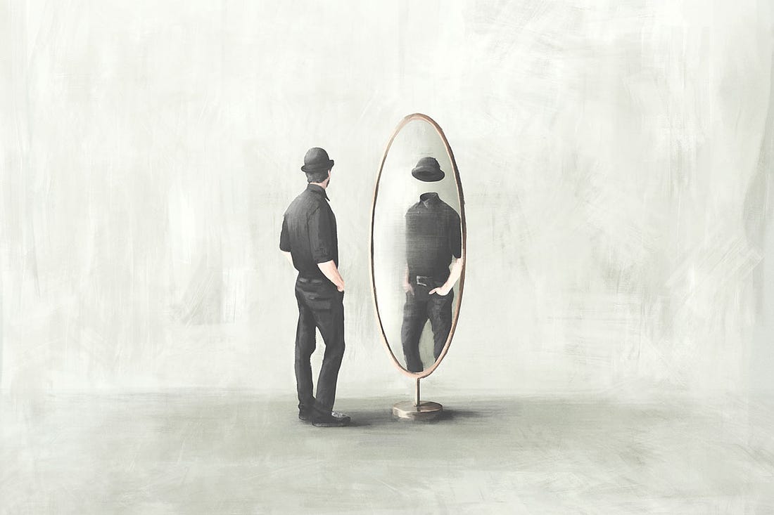 Man Looking Away from Faceless Reflection in Mirror