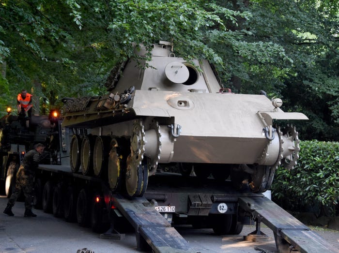The World War Two era Panther battle tank being made ready for transportation from a 84-year-old's property in Heikendorf, Germany, 02 July 2015.