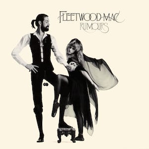 Mostly cream album cover with black-and-white image of tall, bearded gentleman holding a snow globe in front of a blonde, cape-wearing woman. In the top right-hand corner, it is captioned "FLEETWOOD MAC" and "RUMOURS" below it.