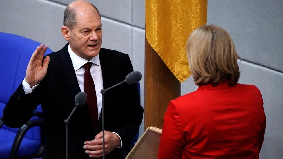 German Chancellor Olaf Scholz takes an oath as he is sworn in by Bundestag President Bärbel Bas at the Bundestag in Berlin, Germany, 08 December 2021