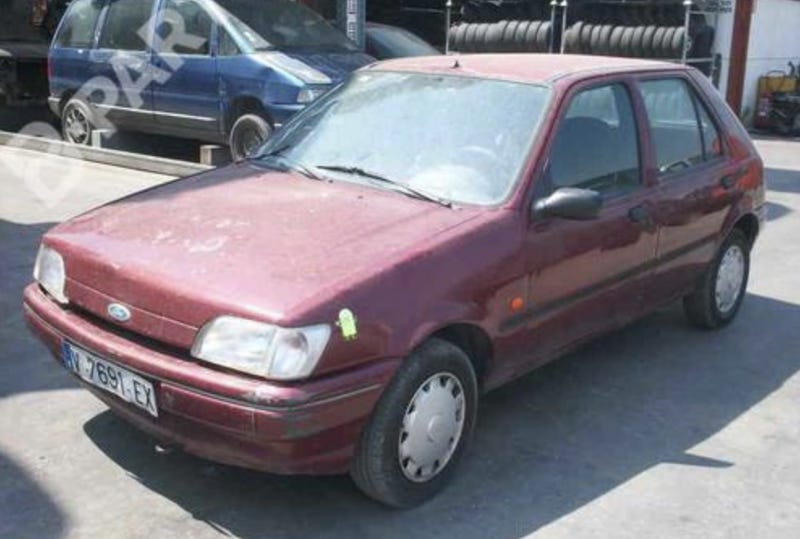 Maroon Ford Fiesta 1995 was my first work vehicle
