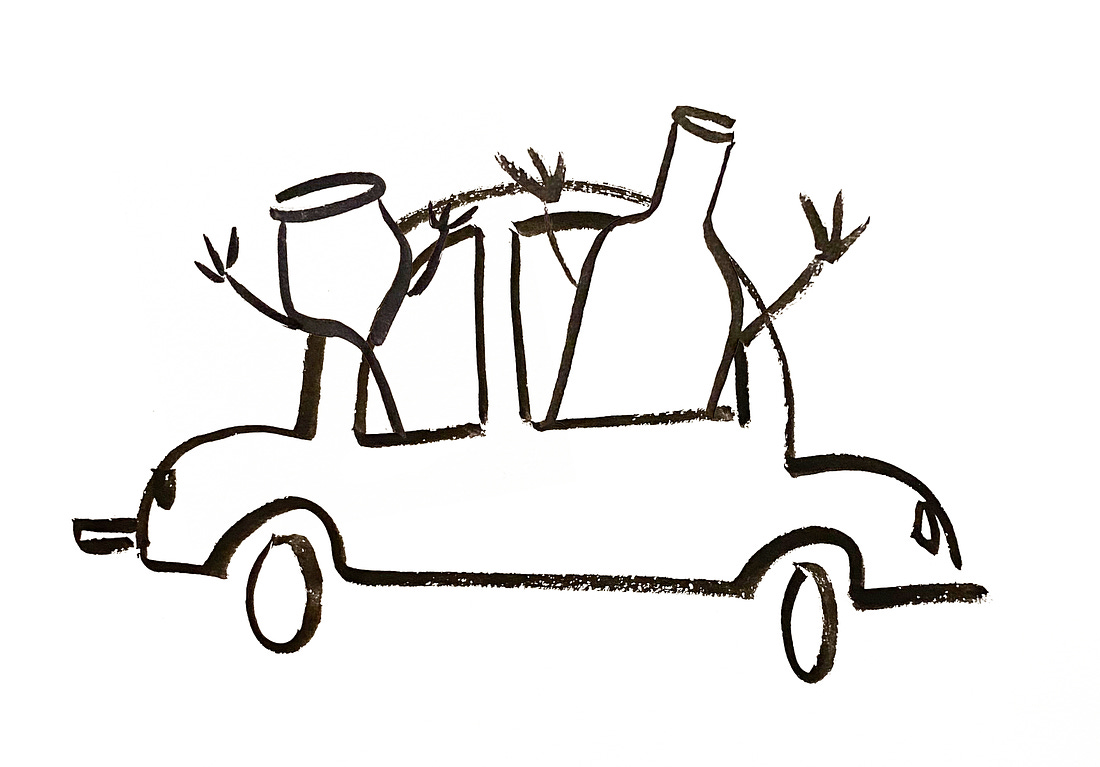 Anthropomorphic wine glasses riding in a car