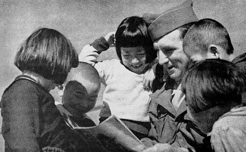 "AMBASSADORS OF GOODWILL: AMERICAN GI TALKING WITH CHILDREN IN JAPAN 1945" by roberthuffstutter is licensed under CC BY 2.0