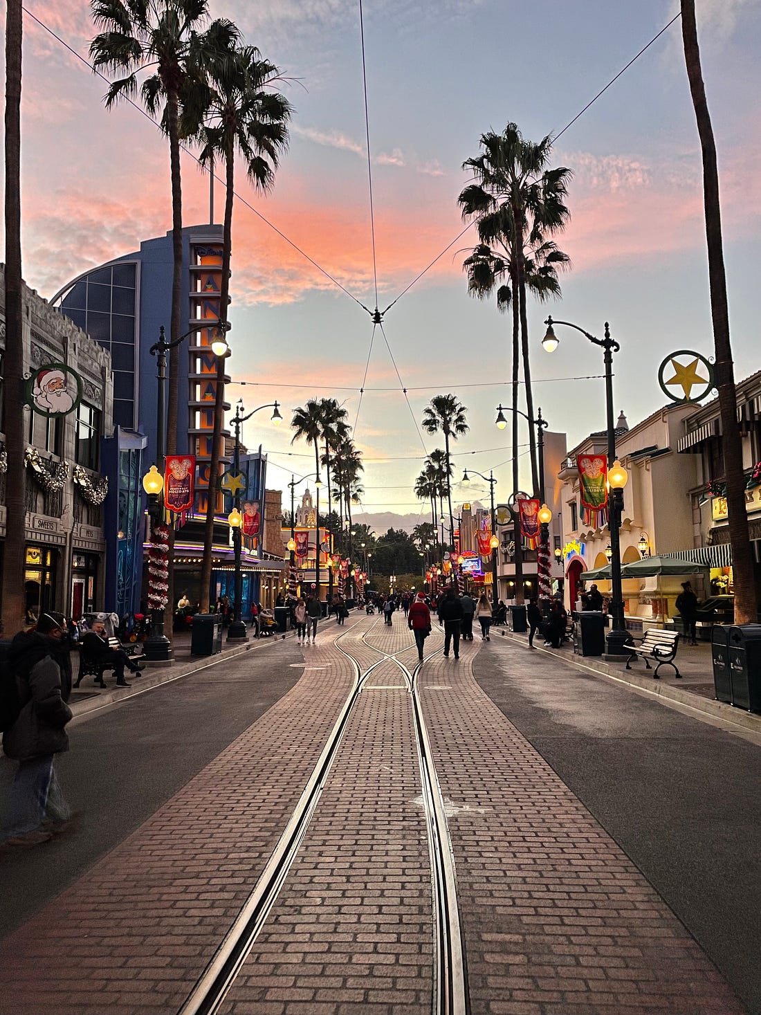 A sunset scene of Hollywood Boulevard in California Adventureland