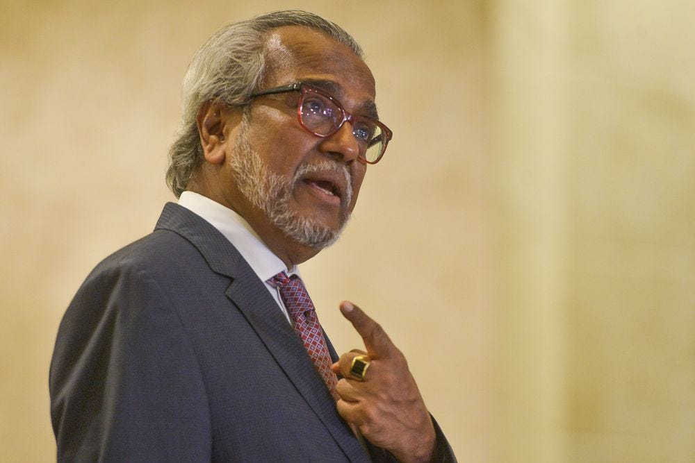 Lawyer Tan Sri Muhammad Shafee Abdullah speaks during a news conference at the Court of Appeal, Putrajaya on April 5, 2021. — Picture by Miera Zulyana