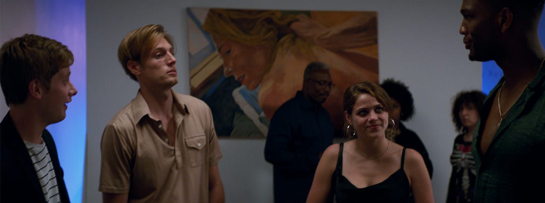From the film "Paint": Three men and a yonug woman hold conversation in an art gallery.