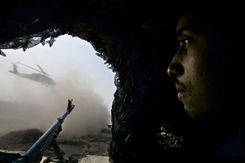 Â A U.S. Blackhawk helicopter leaving an Iraqi police base in Baghdad, February 2007