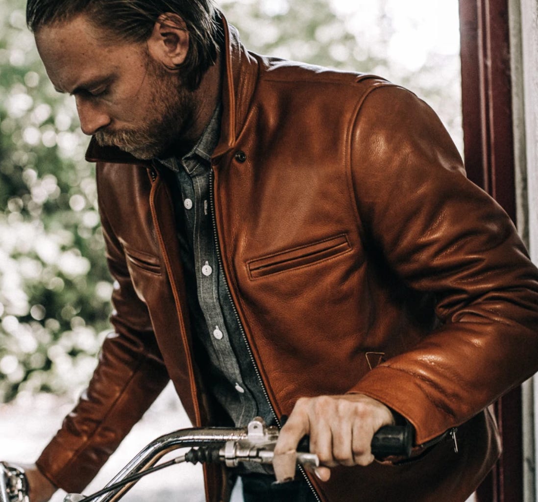 the taylor stitch moto jacket in whiskey steerhide colorway