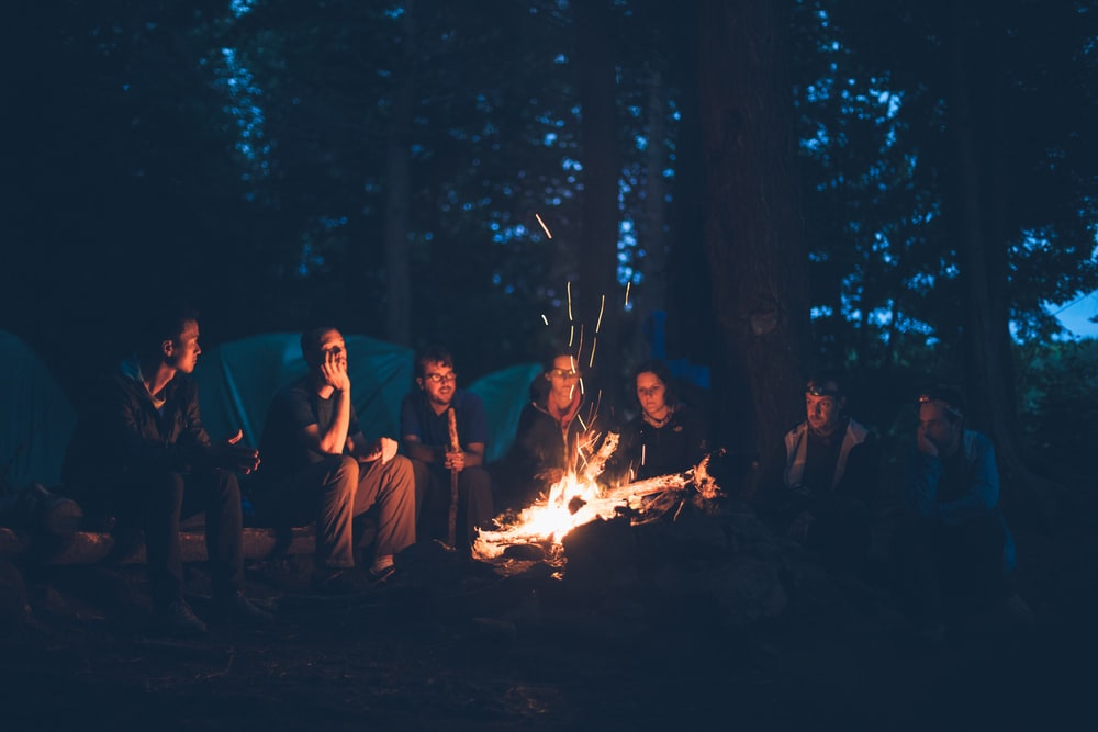 people having a bonfire people having a bonfire