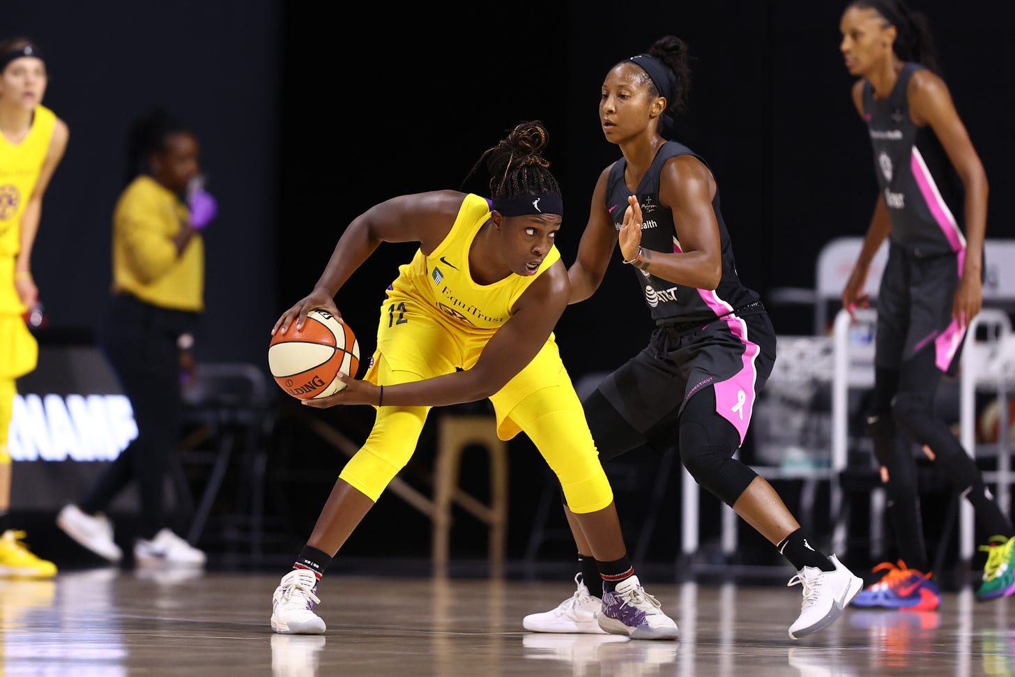 PALMETTO, FL- AUGUST 28: Chelsea Gray #12 of the Los Angeles Sparks handles the ball against the Connecticut Sun on August 28, 2020 at Feld Entertainment Center in Palmetto, Florida. PALMETTO, FL- AUGUST 28: Chelsea Gray #12 of the Los Angeles Sparks handles the ball against the Connecticut Sun on August 28, 2020 at Feld Entertainment Center in Palmetto, Florida.