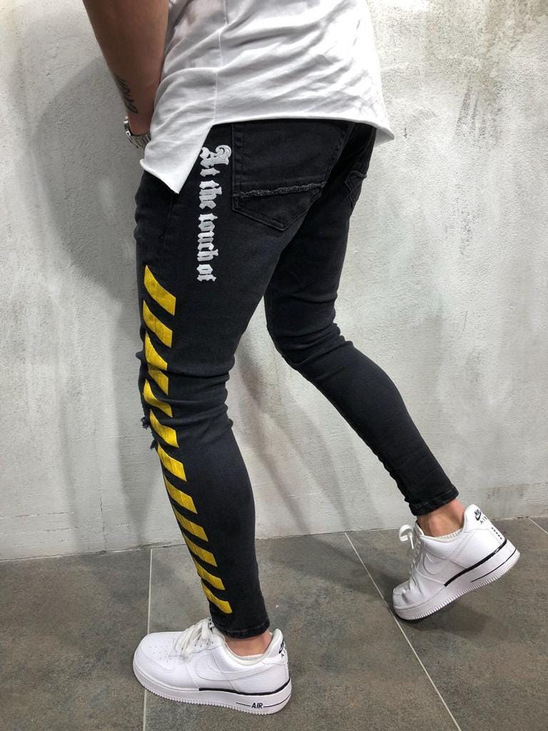 black jeans yellow stripe