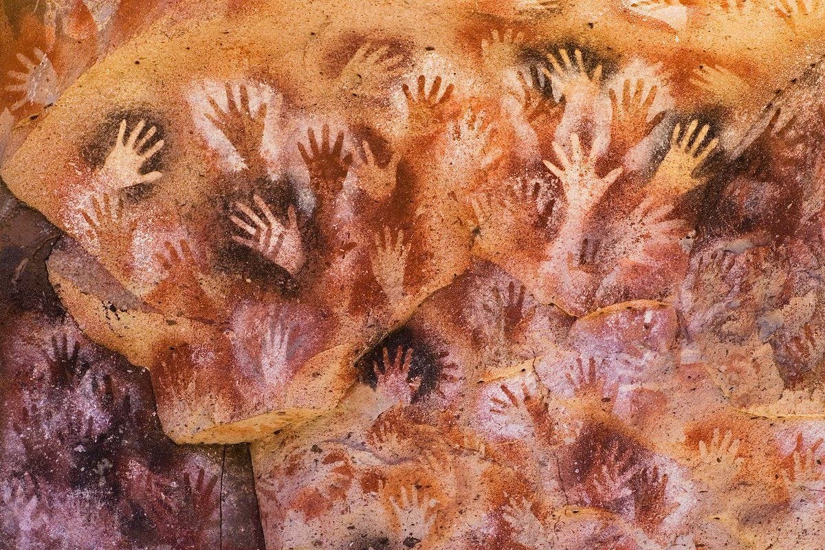 The Cave of Hands' in Argentina. These Prehistoric rock paintings of human  hands were created around 9,000 to 13,000 years ago : interestingasfuck