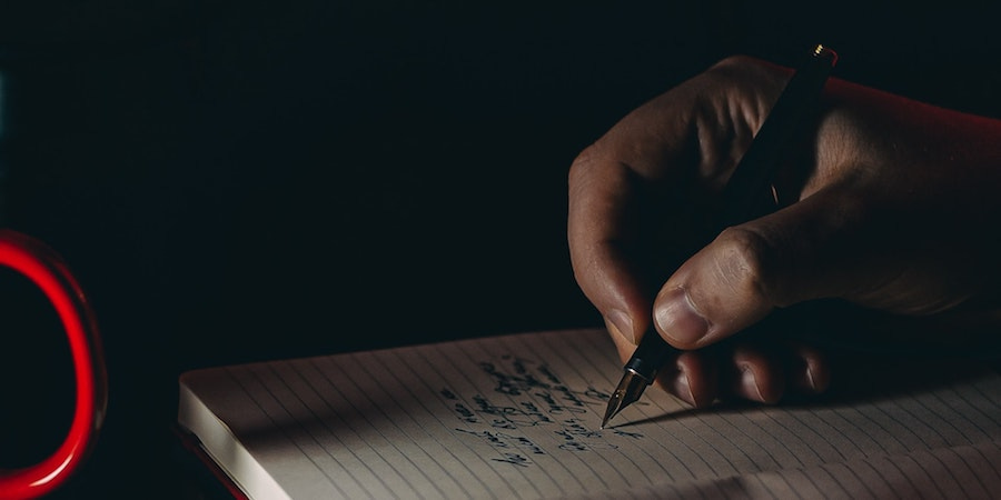 Writing in a notebook Writing in a notebook