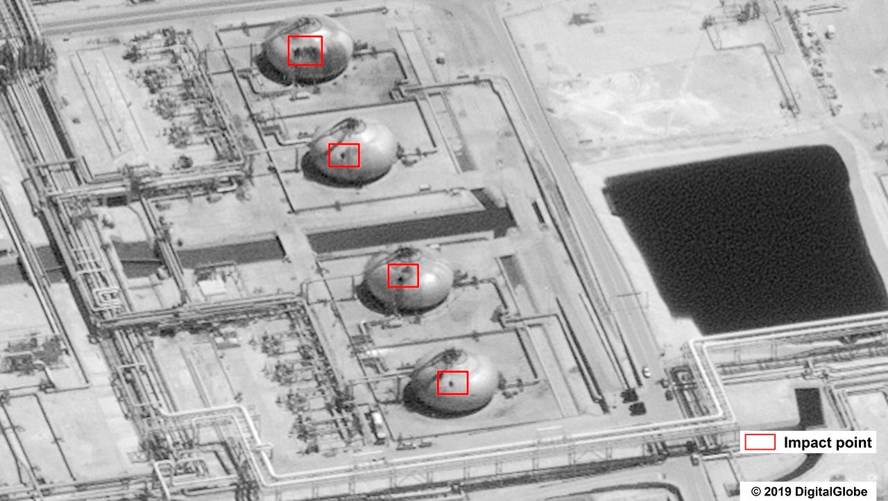 This image provided on Sunday, Sept. 15, 2019, by the U.S. government and DigitalGlobe and annotated by the source, shows damage to the infrastructure at Saudi Aramco's Abaqaiq oil processing facility in Buqyaq, Saudi Arabia. The drone attack Saturday on Saudi Arabia's Abqaiq plant and its Khurais oil field led to the interruption of an estimated 5.7 million barrels of the kingdom's crude oil production per day, equivalent to more than 5% of the world's daily supply. (U.S. government/Digital Globe via AP)