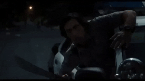 Adam Driver cuts the head off a zombie with a machete. From The Dead Don't Die. [gif]