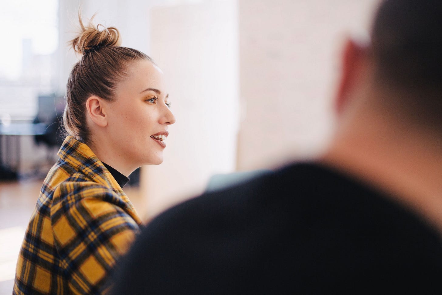 image of a woman and man in a brainstorming meeting image of a woman and man in a brainstorming meeting